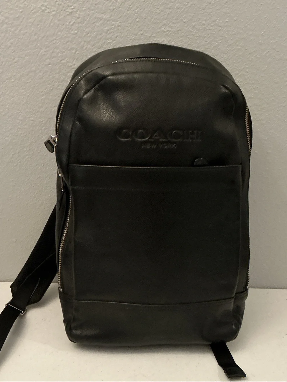 Coach Black Leather Sling Backpack with Front Pocket